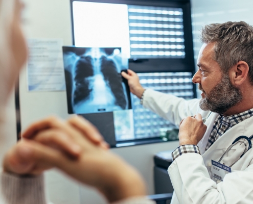 Doctor with lung cancer patient